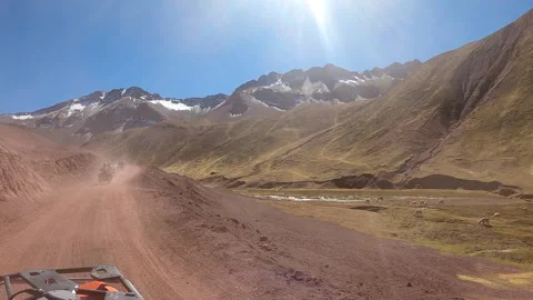 ATV quad bikes riding through the spectacular Andes mountains Stock Footage 344306250