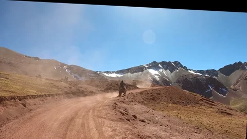 ATV quad bikes riding through the spectacular Andes mountains Stock Footage 344306634