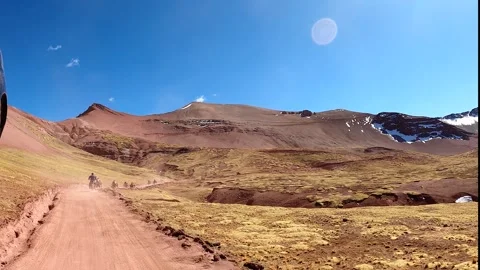 ATV quad bikes riding through the spectacular Andes mountains Stock Footage 344306803