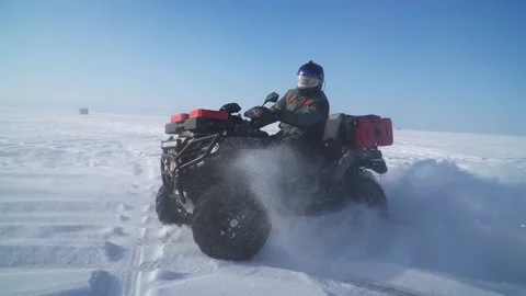 Atv-riders drift in the snow Stock Footage 172244756