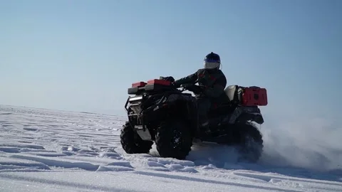 Atv-riders drift in the snow Stock Footage 172244795