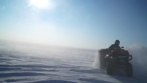 Atv-riders drift in the snow Stock Footage 172244835