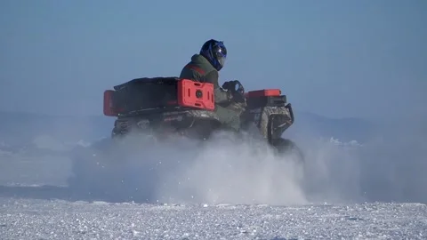 Atv-riders drift in the snow Stock Footage 172244890
