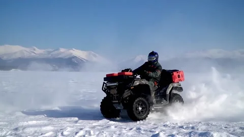 Atv-riders drift in the snow Stock Footage 172245044