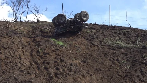 ATV rolling down hill Stock Footage 93117064