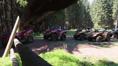 ATV stands in the middle of a forest 스톡 동영상 89729605