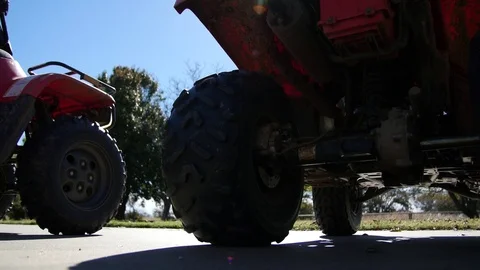 Atv from underneath with lens flare Stock Footage 79338190