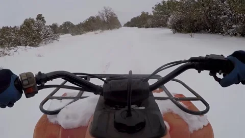 ATV In Winter Snow On Back Road- Slow Motion Stockbeeldmateriaal 312370565