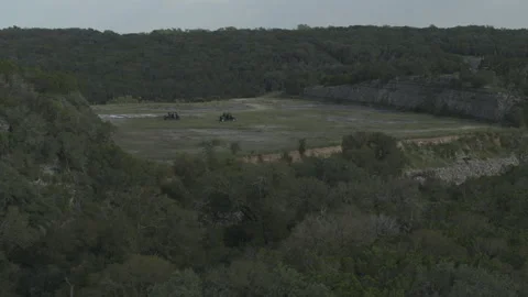 ATVs Racing Off Road in the Wilderness Stock Footage 323402016