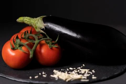Aubergine with tomato Stock Photos