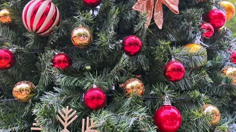 Aubles and other Tinsels as decorations on a Christmas tree Stock Footage 322973228