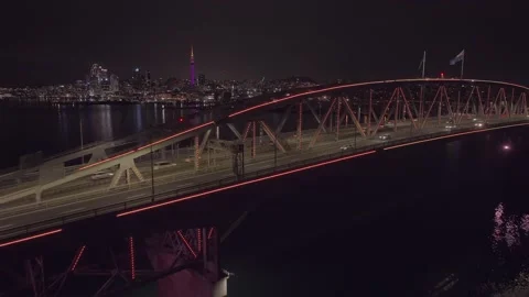Auckland harbour bridge lit up at night, New Zealand Stock Footage