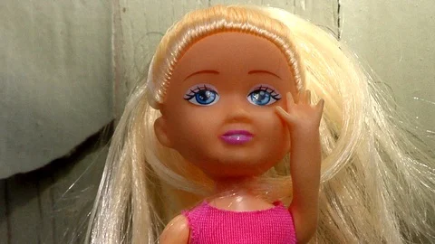 Audacious Doll Is Saddened by Peeling Paint Stock Footage 105204805