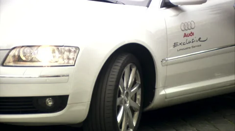 Audi A8 L moving away, Audi Exclusive Limousine, cobblestone road, city center Stock Footage 48990475