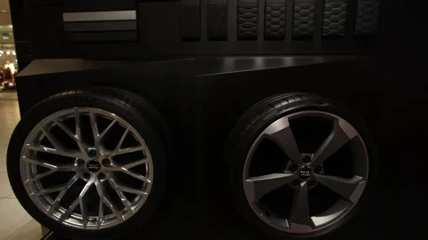 Audi Car Wheels on the Wall Store Stock Footage 156613205