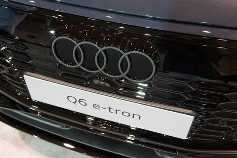 Audi Q6 e-tron EV front four rings logo and grille close-up at ECAR Show 2026 Stock Photos