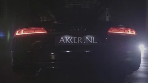 Audi R8 Driving in Industrial Warehouse Stock Footage