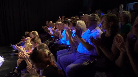 The audience applaud the artists Stock Footage 95807964