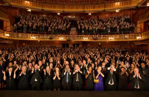 Audience applauding in theater Stock Photos