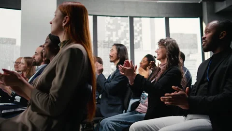 Audience clapping hands and applauding during speech Stock Footage 327685609
