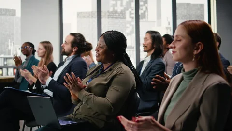 Audience clapping hands and applauding after presentation Stock Footage 327763555