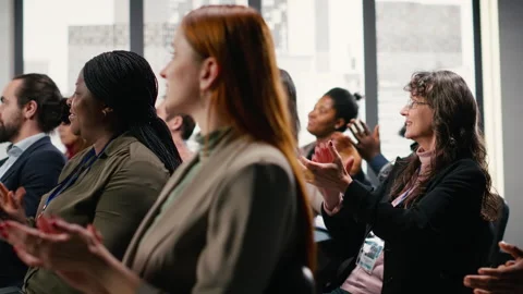 Audience clapping hands and applauding during speech Stock Footage 327881429