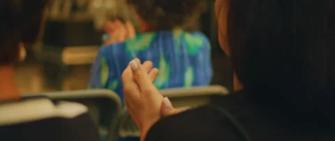 Audience clapping outdoors during a performance or presentation Stock Footage 313700485