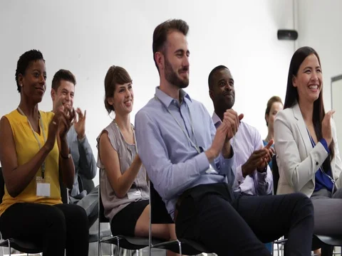 Audience at a conference applauding speaker Stock Footage 79102289