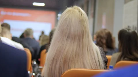 The audience at the conference is highly focused on the presentation being Stock Footage 285948019