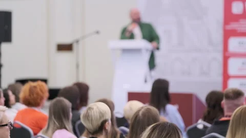 Audience Engaged in Business Presentation During Live Conference Event Stock Footage 310803661