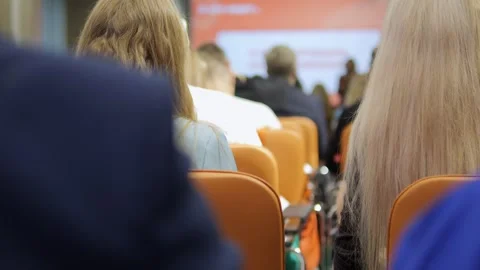 Audience Engaging While Attending a Conference Presentation During an Event Stock Footage 284908192