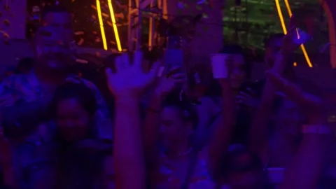 Audience Enjoying Dance Performance During Nightclub Event 4K Stock Footage 337886255