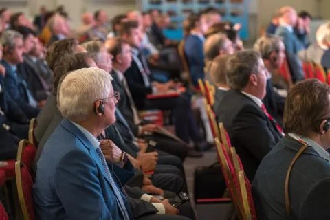 Audience listens to the lecturer Stock Photos