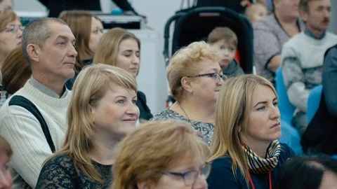 The audience listens to the speaker. Stock Footage 112864068