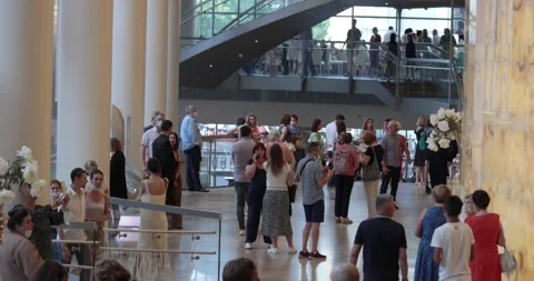 The audience in the lobby of the theatre before the performance Stock-Footage 157364326