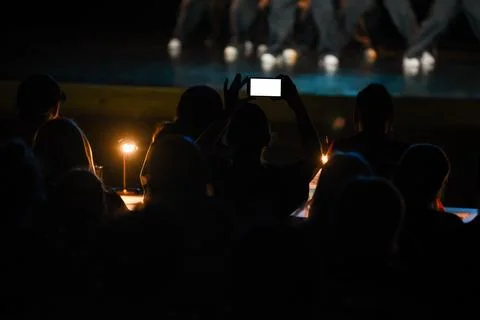 Audience Recording Live Performance on Smartphone Stock Photos