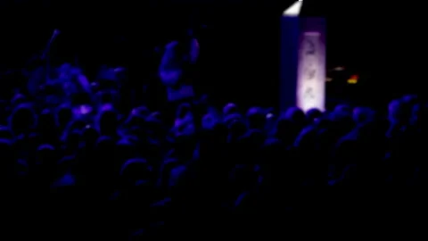 Audience at rock concert soft focus purple light. Stock Footage 332074035