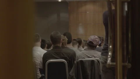 Audience Sitting in Seminar Room Viewed Through Doorway Stock Footage 342566141