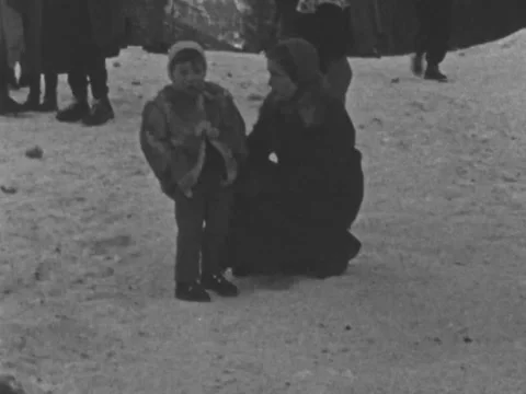 Audience at the ski jumping hill in Cortina d'Ampezzo in 1956 Stock Footage 197654355
