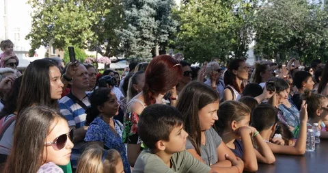 Audience watching a folk dance show at Plovdiv Stock Footage 93890093