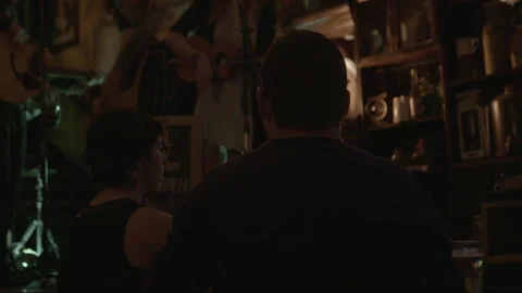 Audience Watching Live Music Performance in Dimly Lit Pub 스톡 동영상 343951227