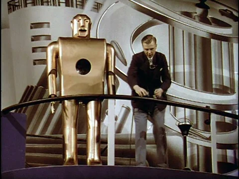 Audiences watch a demonstration of a robot smoking a cigarette at the 1939  New