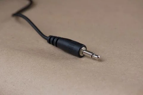 Audio Cable on brown background Stock Photos