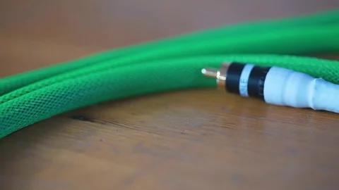 The audio cable is on the table Stock Footage 76644800
