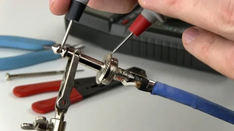 Audio cable troubleshooting Stock Footage 10592041