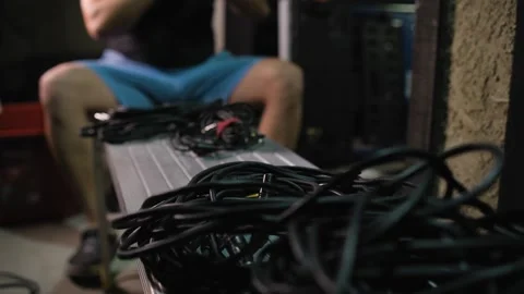 Audio Cables With DJ Preparing Gear in Background Stock Footage 340932924