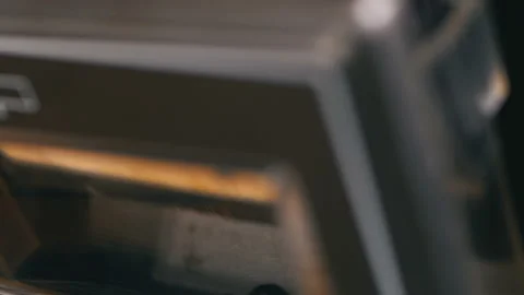 Audio Cassette is inserted into the Deck of the Audio Tape Recorder Playing and Video stock 103990735