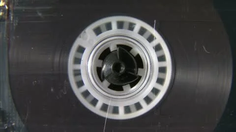 Audio cassette reel playing Vídeos de archivo 12997739