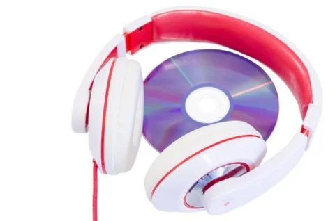 Audio compact disc and red white headphones Foto stock
