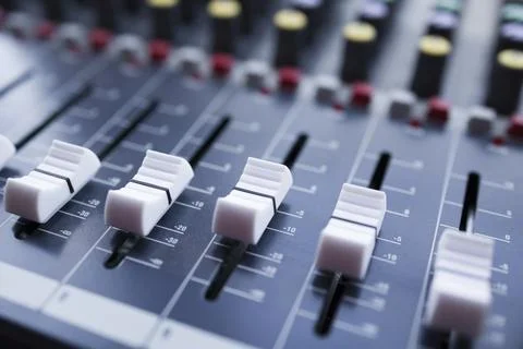 Audio control panel with slide bar . Soft focus . Sound mixer close up view Stock Photos